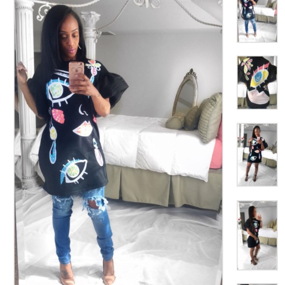 Oversized top with eyes and butterfly sleeves